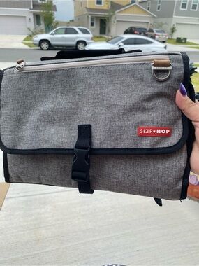 Skip Hop Gray and Black Men’s Hanging Toiletry Case with Red Logo